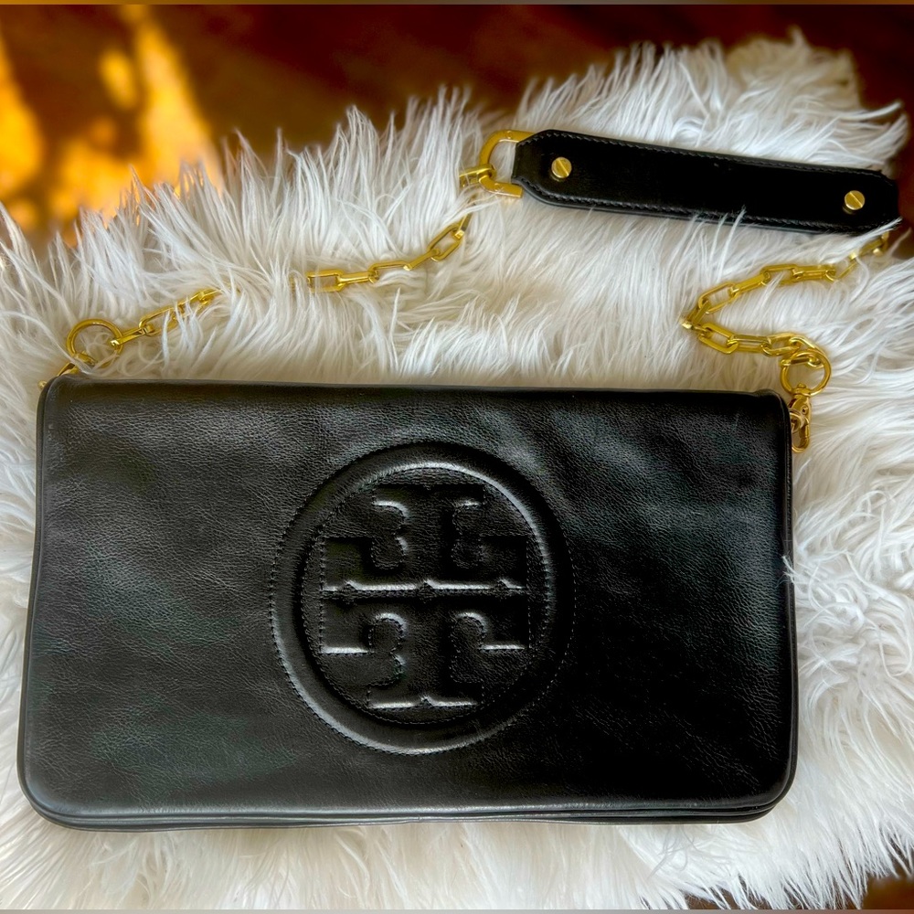 Tory Burch Black leather large clutch.